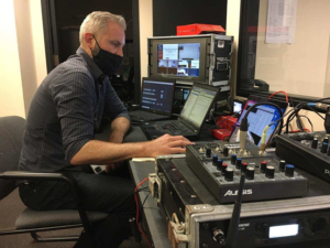 Director/Technical Director/Streaming Tech John Bogley working with Blackmagic ATEM 2 switcher and encoding laptops