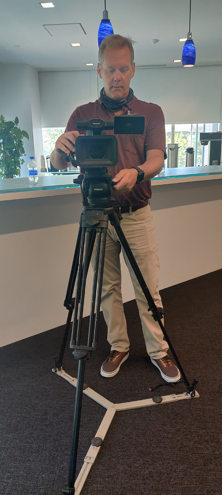 MTI videographer Shawn Chadwick sets up the first Panasonic AGDVX 200 camera for the interview.