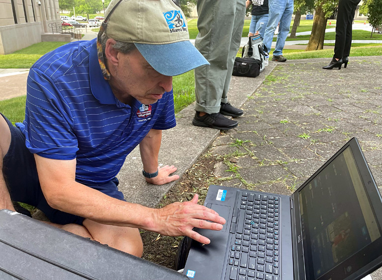 Always Aware of the Details: Field Producer Dave Lilling monitors the livestream. 