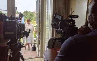 Legendary entrepreneur Sheila Johnson puts her demanding eye on the scene before stepping in front of our camera for an interview.