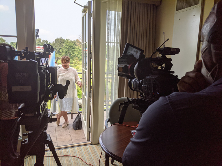 Legendary entrepreneur Sheila Johnson puts her demanding eye on the scene before stepping in front of our camera for an interview.