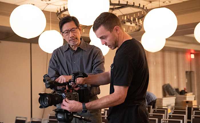Director Ben Wong supervises a dolly shot with the Sony FS7 MarkII camera, Video Production MTITV