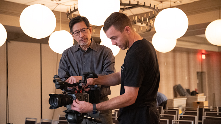 Director Ben Wong supervises a dolly shot with the Sony FS7 MarkII camera.