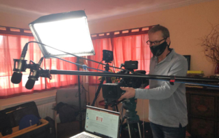 MTI's one-man video production crew Shawn Chadwick sets up the shot, with the help of the Sony FS7 camera, Aperture lights, and Atomos Shogun 7 monitor.