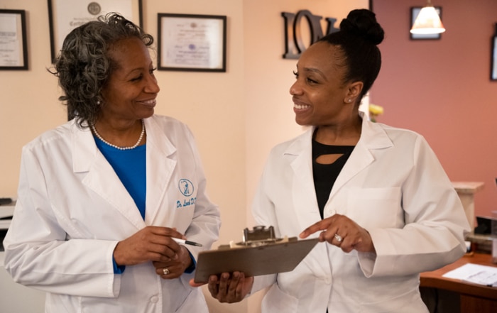 Smile After Smile dentists Dr. Evelyn Leach (l) and Dr. Ifeoma Essien.