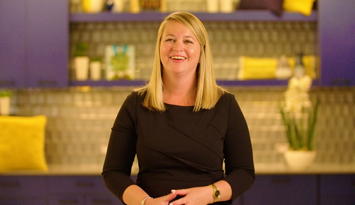 Sonya Miller, Senior Director, Enterprise Clients at Colliers, looks happy with her first on-camera spot.