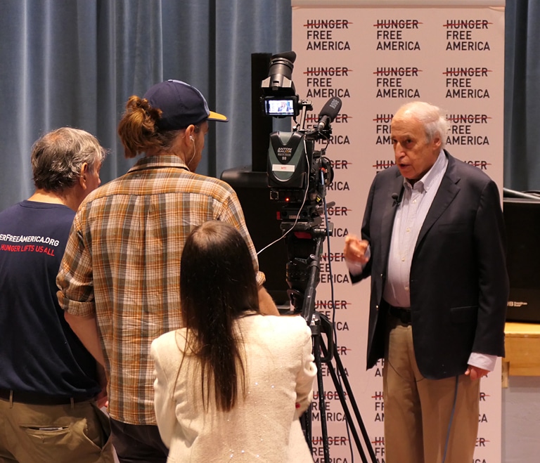 DP Ian Sbacio interviews Dan Glickman, former U.S. Secretary of Agriculture, at the National Day of Service event. (Photo by Ashley Tillery.)