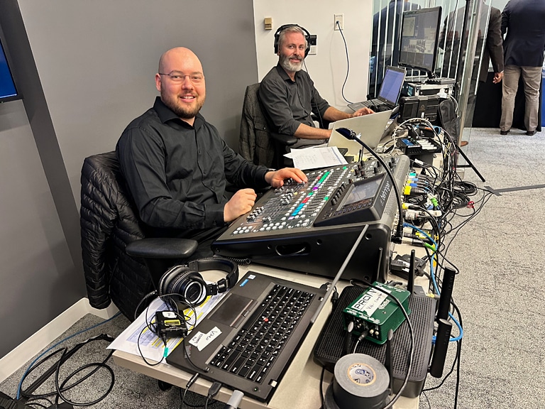 Audio engineer Josh Roberts (l) and streaming director John Bogley at the many controls for this complicated production.