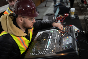 Audio tech Josh Roberts makes sure the Behringer audio board delivers proper sound to everyone.