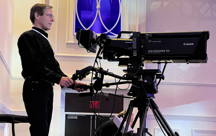 Albert Liesegang handles the large front-of-house video camera for the CVS live event.