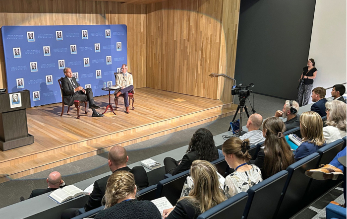 Our crew, Audio Engineer John O'Brien and Videographer John Bogley can be seen in the front row, monitoring the one-camera setup for the livestream.